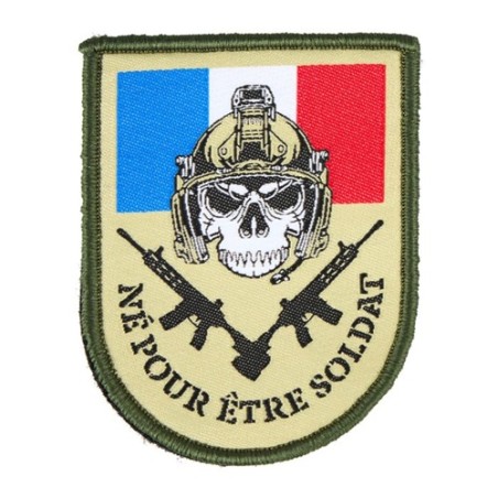 Ecusson : "né pour être soldat"